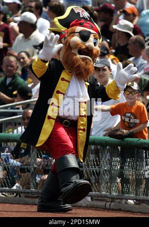 The mascot of the Pittsburgh Pirates, the Pirate Parrot, wears a Pride  shirt during Pride Night at a baseball game between the Pittsburgh Pirates  and the New York Mets in Pittsburgh, Friday