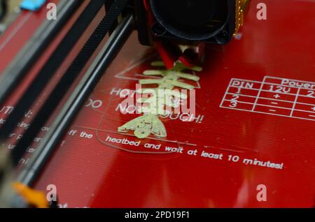 3D printer prints red form Stock Photo