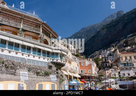 Positano is a village and comune on the Amalfi Coast (Province of Salerno), in Campania, Italy, mainly in an enclave in the hills leading down to the Stock Photo