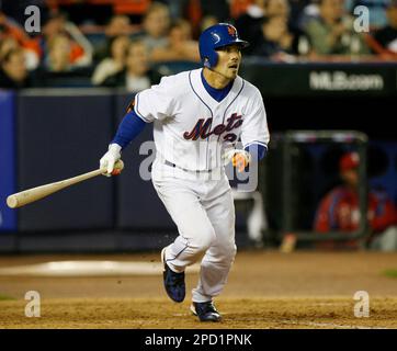 New York Mets' second baseman Kazuo Matsui comes in at the end of the half  inning as the Mets take on the Nationals who play their first game at Shea  Stadium in