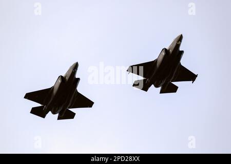 Lockheed Martin F-35 Lightning II fighter jets of the Royal Netherlands Air Force in flight over Leeuwarden Air Base, The Netherlands - March 30, 2022 Stock Photo