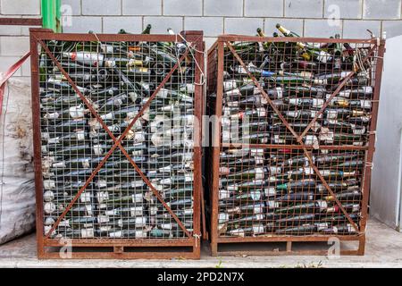 Bottles of champagne storage to recycle, recycling center Stock Photo