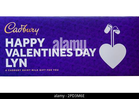 Cadbury Happy Valentines Day personalised large 850g Cadbury Dairy Milk Chocolate bar on white background - Valentines Day gift Valentine Day present Stock Photo