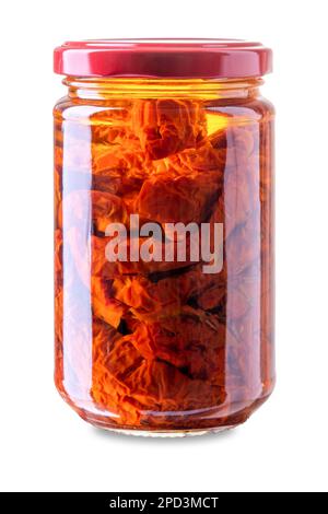 Sun dried tomatoes in olive oil in glass jar, isolated on white, clipping path included Stock Photo
