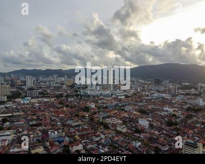 George Town, Penang, Malaysia - May 27 2022: Aerial view Komtar building and heritage old building in sunset cloud Stock Photo