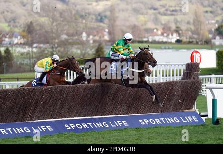 Jonbon ridden by jockey Aidan Coleman clear a fence during the Sporting Life Arkle Challenge Trophy Novices' Chase on day one of the Cheltenham Festival at Cheltenham Racecourse. Picture date: Tuesday March 14, 2023. Stock Photo