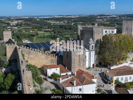 Obidos Town in Portugal. It is located on a hilltop, encircled by a fortified wall. Famous Place. Stock Photo