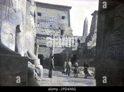 circa 1940s, historical, visitors at the ancient Egyptian ruins at the Temple of Karnak, Luxor, Egypt. Stock Photo