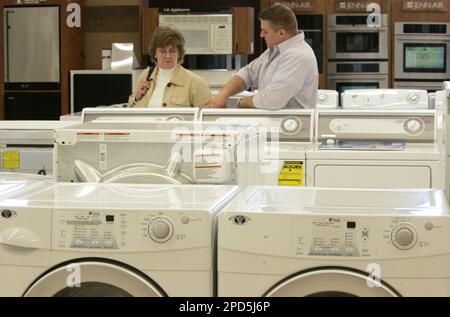 Behind a line of Maytag a Whirlpool brand dryers Jean Beller of