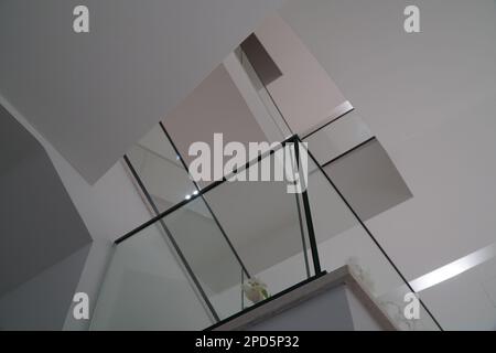 SARAJEVO, BOSNIA AND HERCEGOVINA, 30.8.2022: Interior marble stairs in business building, modern office interior with glass elements, stairs and fence Stock Photo