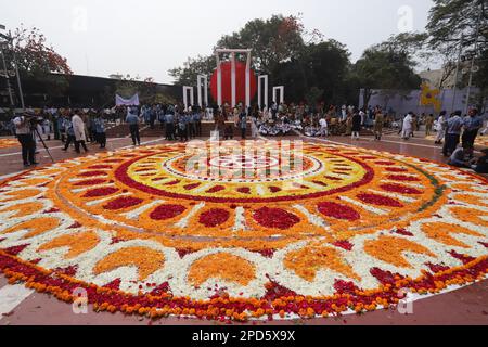The nation paid tribute to the martyrs of the 1952 Language Movement at the Central Shaheed Minar in Dhaka on the first hour of Martyrs Day on Tuesday Stock Photo
