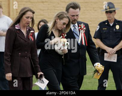 Curtis Bolin, father of murder victim Jamie Rose Bolin, looks at a coin ...