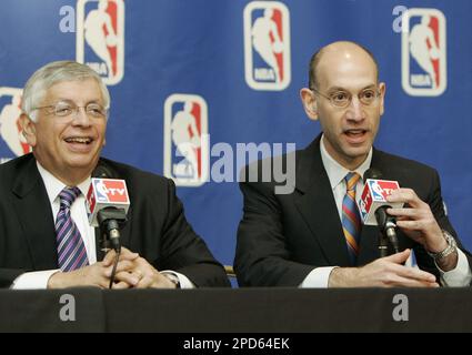 Russ Granik, deputy commissioner of the NBA, left, and Washington Wizards  owner Abe Pollin, right, announce during a news conference at the MCI  Center in Washington, Saturday, Dec. 4, 1999, that the