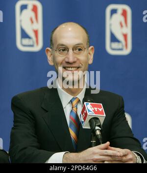 Russ Granik, deputy commissioner of the NBA, left, and Washington Wizards  owner Abe Pollin, right, announce during a news conference at the MCI  Center in Washington, Saturday, Dec. 4, 1999, that the