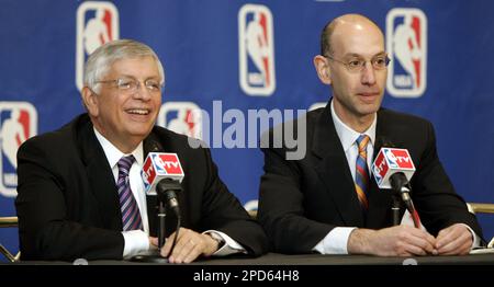 Russ Granik, deputy commissioner of the NBA, left, and Washington Wizards  owner Abe Pollin, right, announce during a news conference at the MCI  Center in Washington, Saturday, Dec. 4, 1999, that the