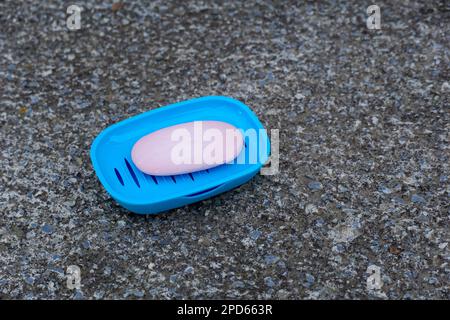 used soap in plastic dish ,health and personal hygiene concept. Stock Photo