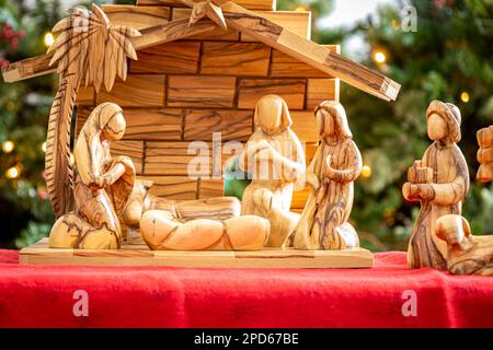 Baby Jesus missing from the manger in a creche nativity set made of olive tree wood from the Holy Land Stock Photo