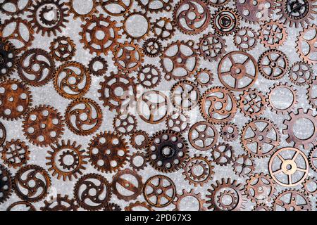 Lot of metal gears gray background Stock Photo