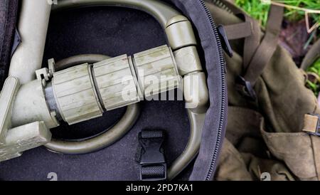 Metal detector lying on grass Stock Photo - Alamy