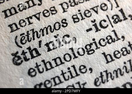 Definition of word ethnic on dictionary page, close-up Stock Photo