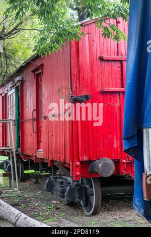 photograph of old wooden wagon in disuse on siding Stock Photo