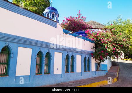 Amazing colorful buildings in pueblo magico Batopilas in Barrancas del Cobre mountains, Mexico Stock Photo