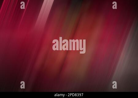 Abstract background, vertical multicolored stripes of red scale with a slope in to left and blur in the middle, blur Stock Photo