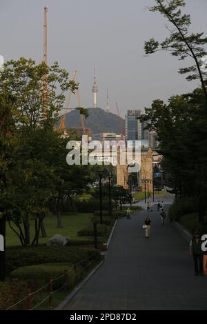 View on Independence gate (Dongnimmun) and Television tower in Seoul, Korea Stock Photo