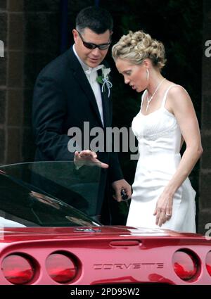 Rusty Yates Opens The Car Door For His New Bride Laura Arnold As They ...