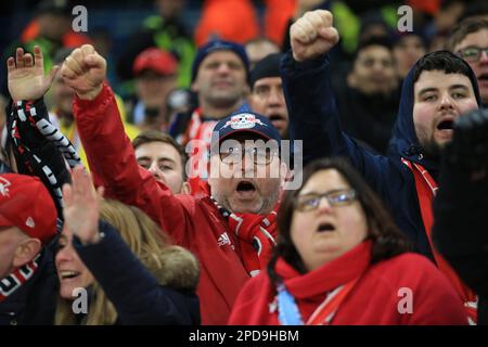 Manchester, UK. 14th Mar, 2023. Soccer: Champions League, Manchester City - RB Leipzig, knockout round, round of 16, second leg at Etihad Stadium, Leipzig fans celebrate in the stands. Credit: Parnaby Lindsey/dpa/Alamy Live News Stock Photo