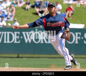 Atlanta Braves shortstop Tony Pena throws out Los Angeles Dodgers