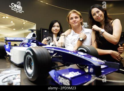 German Williams Formula One rookie Nico Rosberg center poses