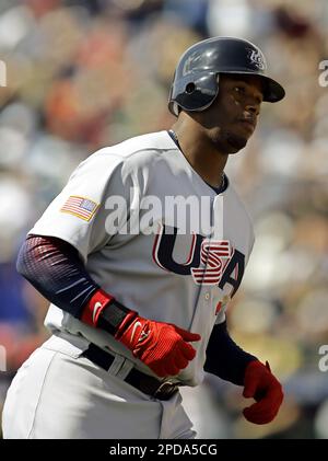 Team USA's Ken Griffey Jr. circles the bases after hitting a