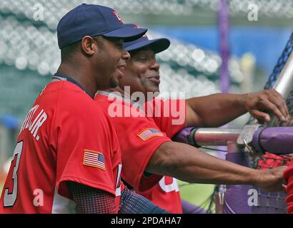 Team USA outfielder Ken Griffey Jr. jokes with teammates fielding fly balls  during batting practice Thursday, March 9, 2006, at Scottsdale Stadium in  Scottsdale, Ariz. Team USA is preparing to play South