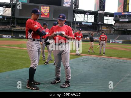 Team USA manager Buck Martinez arrives to pull USA starting