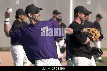 Arizona Diamondbacks Luis Gonzalez waves to some Colorado Rockies warming  up prior to start of four-game series at Coors Field in Denver August 14,  2006. (UPI Photo/Gary C. Caskey Stock Photo 