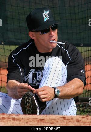 Florida Marlins manager Joe Girardi looks at the field during the team's  home opener baseball game against the San Diego Padres Tuesday, April 11,  2006, in Miami. The Pasres won 9-3. (AP