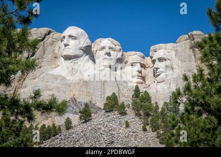 The busts of Presidents George Washington, Thomas Jefferson, Teddy Theodore Roosevelt, and Abraham Lincoln carved Borglum into the Black Hills of Sout Stock Photo