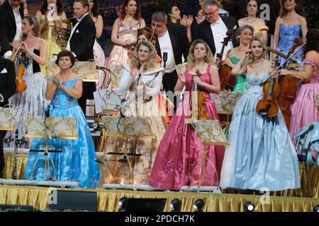 Madrid, Spain. 14th Mar, 2023. Members of the Johann Strauss-Andre Rieu Orchestra, performs during the Tour 2023 concert at the wizcenter in Madrid. Credit: SOPA Images Limited/Alamy Live News Stock Photo