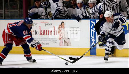 New York Rangers (6) Darius Kasparaitis chases Toronto Maple Leafs