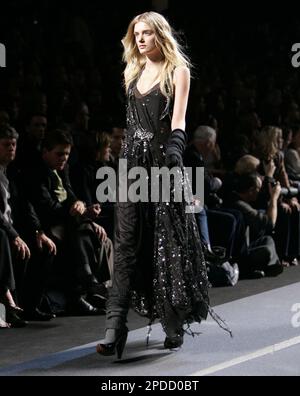 A Model walks down the runway wearing creations by Marc Jacobs for Louis Vuitton's  Fall-Winter 2006-2007 Ready-to-wear collection presentation in Paris,  France, on March 3, 2006. Photo by Java/ABACAPRESS.COM Stock Photo 