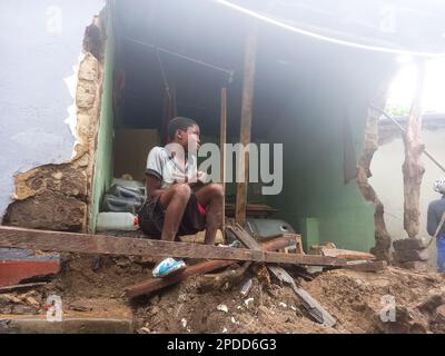 (230314) -- BLANTYRE (MALAWI), March 14, 2023 (Xinhua) -- A boy sits at a damaged house in Blantyre, Malawi, on March 14, 2023. Tropical Cyclone Freddy has continued to cause devastation in the southern African region as the death toll from disasters such as flash floods and mudslides continues to rise. In Malawi, where the impact of the cyclone looks the most severe, the death toll has risen to 190 as more bodies were found Tuesday following the damages caused by tropical cyclone Freddy, which has now affected 12 districts and cities in the southern African nation, according to the country's Stock Photo