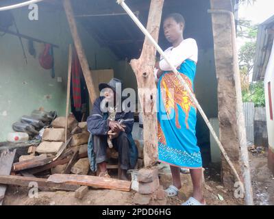 (230314) -- BLANTYRE (MALAWI), March 14, 2023 (Xinhua) -- People are seen at a damaged house in Blantyre, Malawi, on March 14, 2023. Tropical Cyclone Freddy has continued to cause devastation in the southern African region as the death toll from disasters such as flash floods and mudslides continues to rise. In Malawi, where the impact of the cyclone looks the most severe, the death toll has risen to 190 as more bodies were found Tuesday following the damages caused by tropical cyclone Freddy, which has now affected 12 districts and cities in the southern African nation, according to the count Stock Photo