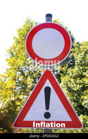 road sign passage prohibited, and Caution, danger point!, lettering Inflation Stock Photo