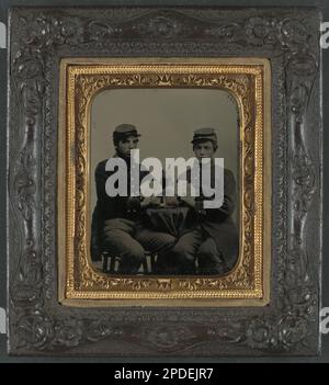 A photograph of two unidentified Union soldiers from the American Civil ...