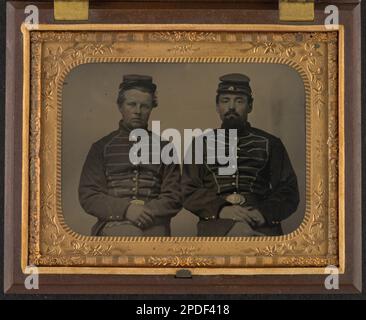 A photograph of two unidentified Union soldiers, one in a captain's ...