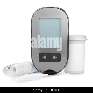 Digital glucometer, container, lancets and pen on white background. Diabetes control Stock Photo