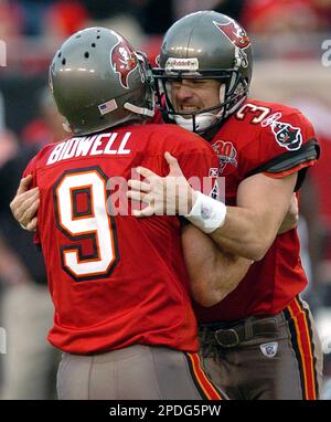 Tampa Bay Buccaneers' fullback Mike Alstott (40) talks with Josh Bidwell  before halftime in a game against the Houston Texans at Raymond James  Stadium Sept. 1, 2005 in Tampa, Fl. The Buccaneers