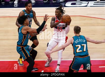 Washington, USA. 14th Apr, 2023. WASHINGTON, DC - MARCH 14: Washington Wizards guard Delon Wright (55) holds the ball away from Detroit Pistons guard Rodney Mcgruder (17), guard Killian Hayes (7) and forward Buddy Boeheim (27) during a NBA game between the Washington Wizards and the Detroit Pistons, on March 14, 2023, at Capital One Arena, in Washington, DC. (Photo by Tony Quinn/SipaUSA) Credit: Sipa USA/Alamy Live News Stock Photo