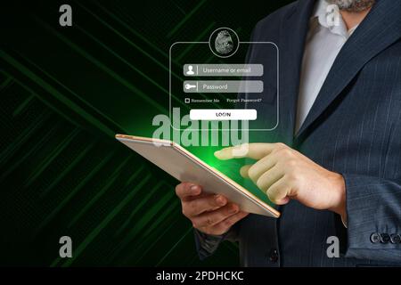 Login using digital device. Man hand using online banking E-commerce Online security payment concept Stock Photo